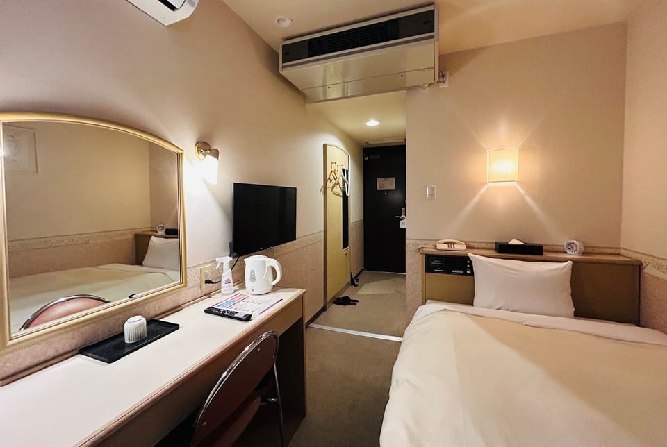 Desk, free WiFi, bed sheets
