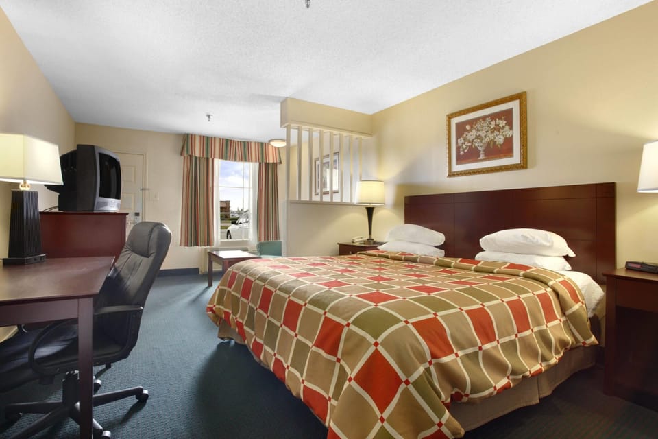 In-room safe, desk, iron/ironing board, cribs (free)