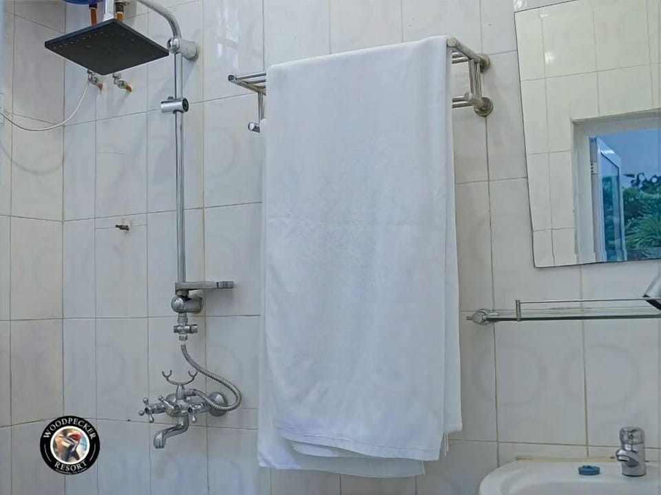 Standard Double Room | Bathroom | Shower, free toiletries, hair dryer, slippers