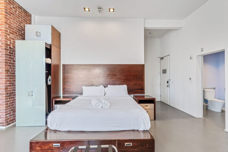 Superior Room, 1 King Bed, Private Bathroom, City View (Self check-in) | Desk, laptop workspace, blackout drapes, iron/ironing board
