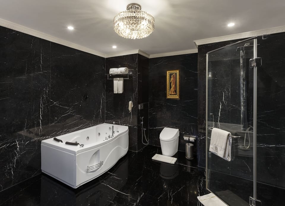 Presidential Suite, Non Smoking, City View | Bathroom | Separate tub and shower, deep soaking tub, rainfall showerhead