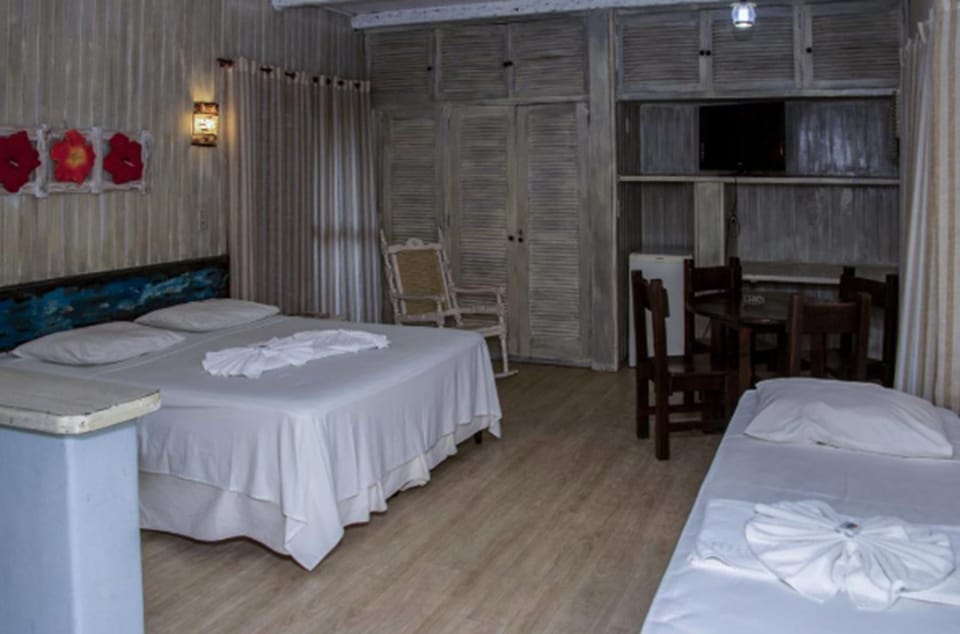 Quadruple Room | Minibar, in-room safe, blackout drapes, iron/ironing board