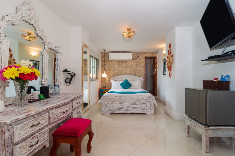 Habitacion Deluxe | Premium bedding, minibar, in-room safe, desk