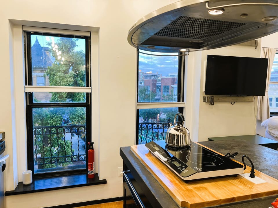 Deluxe Studio, Multiple Beds, Kitchen | Private kitchen | Shared fridge, microwave