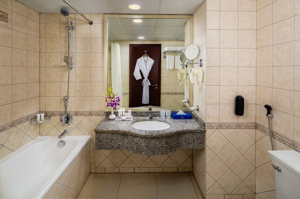 Combined shower/tub, eco-friendly toiletries, hair dryer, bathrobes