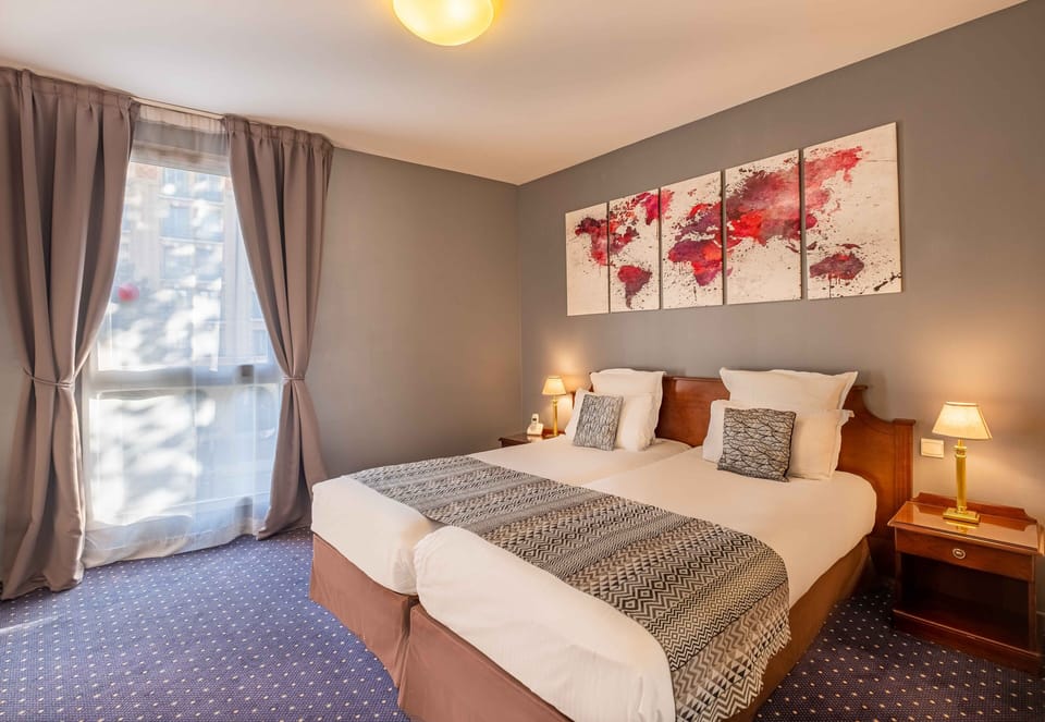 Twin Room (Prestige) | Minibar, in-room safe, desk, blackout drapes