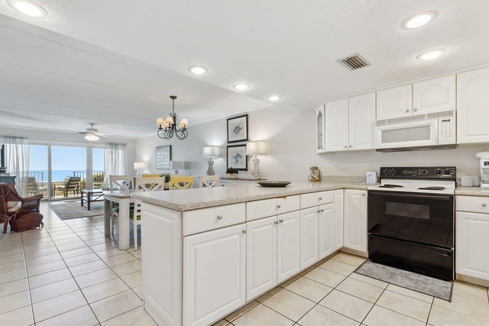 Condo, 2 Bedrooms | Private kitchen | Full-size fridge, microwave, oven, stovetop