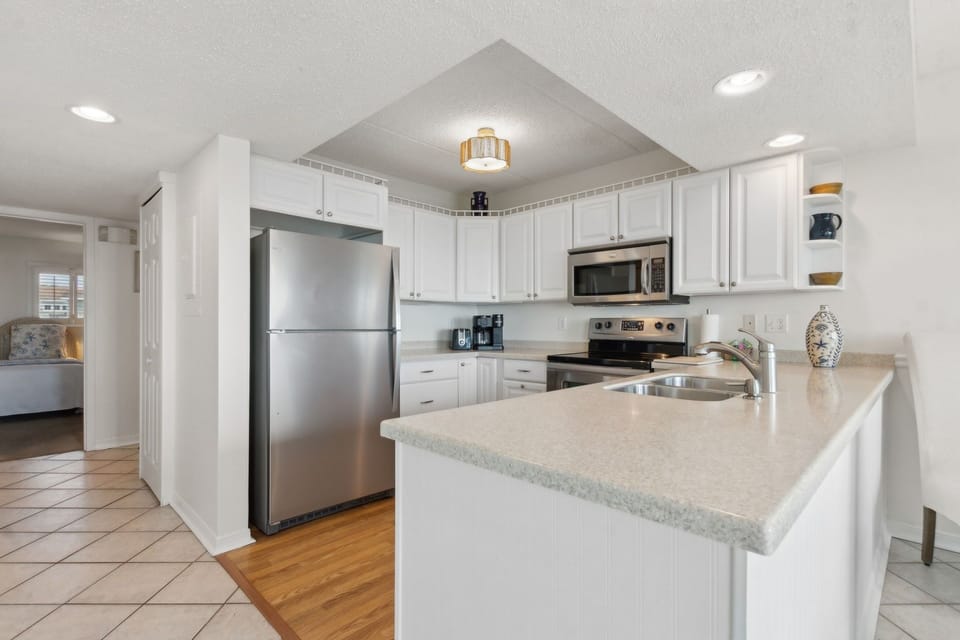 Condo, 2 Bedrooms | Private kitchen | Full-size fridge, microwave, oven, stovetop