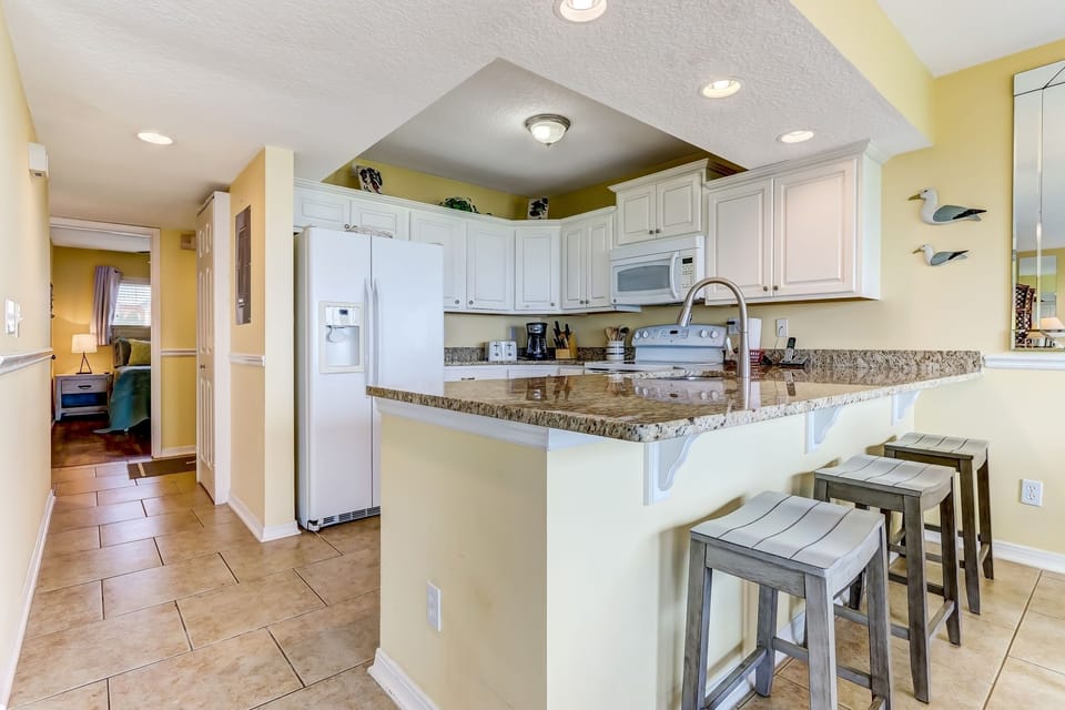 Condo, 2 Bedrooms | Private kitchen | Full-size fridge, microwave, oven, stovetop