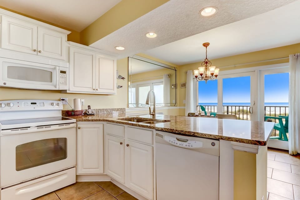 Condo, 2 Bedrooms | Private kitchen | Full-size fridge, microwave, oven, stovetop