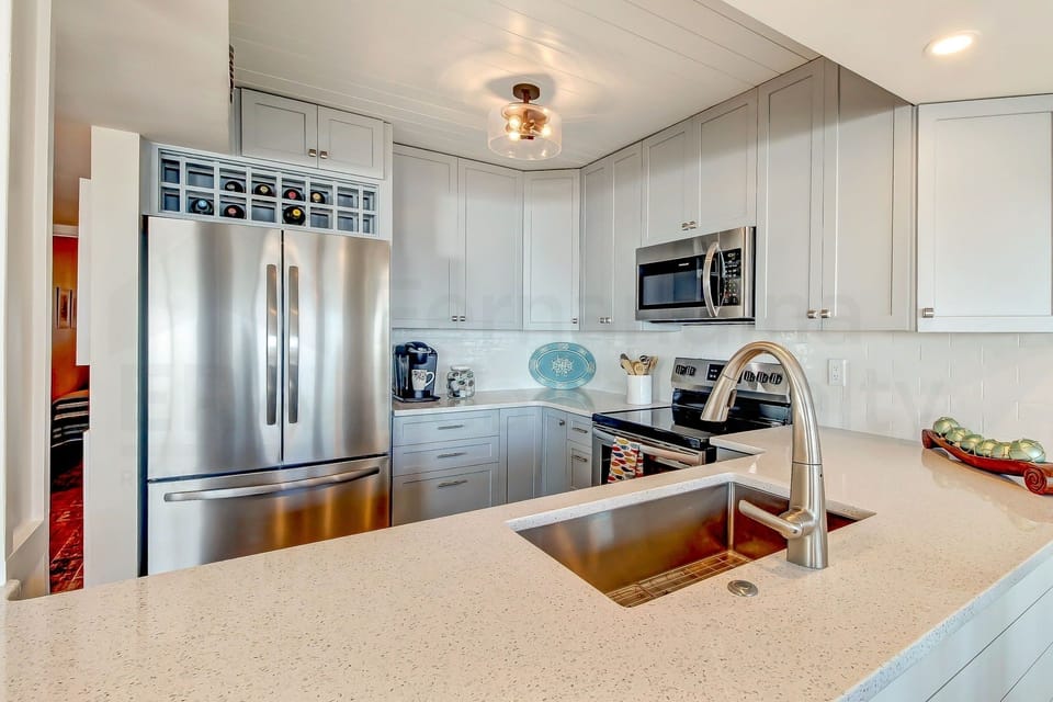 Condo, 2 Bedrooms | Private kitchen | Full-size fridge, microwave, oven, stovetop