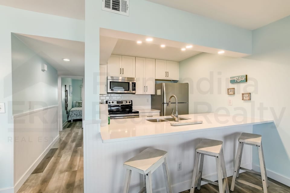Condo, 2 Bedrooms | Private kitchen | Full-size fridge, microwave, oven, stovetop