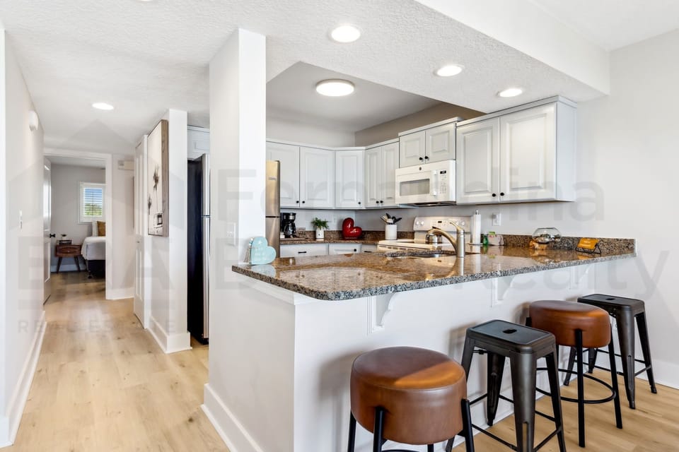 Condo, 2 Bedrooms | Private kitchen | Full-size fridge, microwave, oven, stovetop