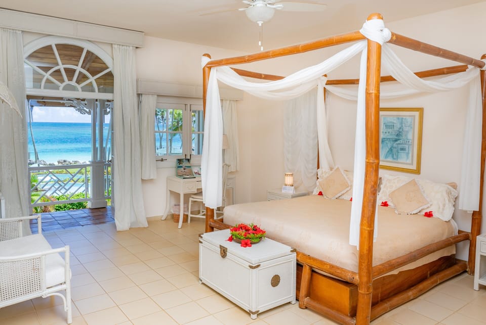 Deluxe Room, Ocean View | In-room safe, individually decorated, individually furnished, desk