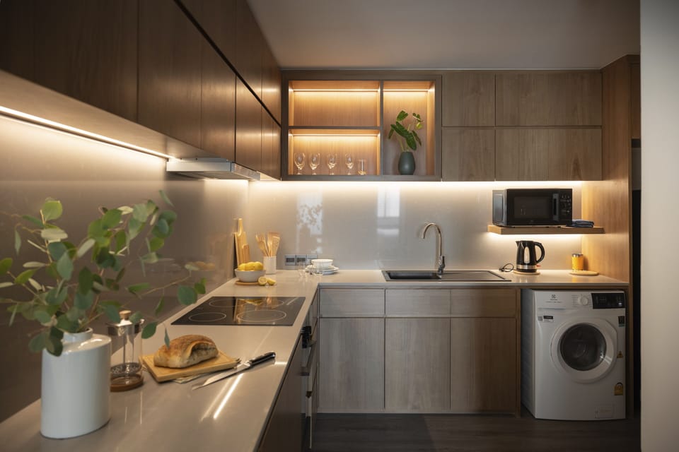 One Bedroom Prestige Suite | Private kitchen | Full-size fridge, microwave, stovetop, electric kettle