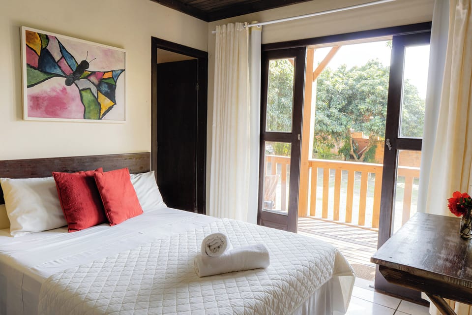 Suite, Garden View | Minibar, desk, blackout drapes, free WiFi