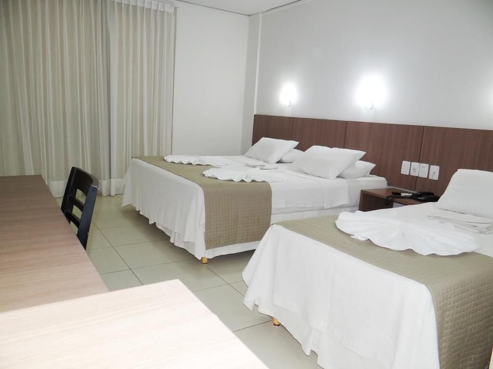Standard Triple Room | 1 bedroom, minibar, desk, blackout drapes