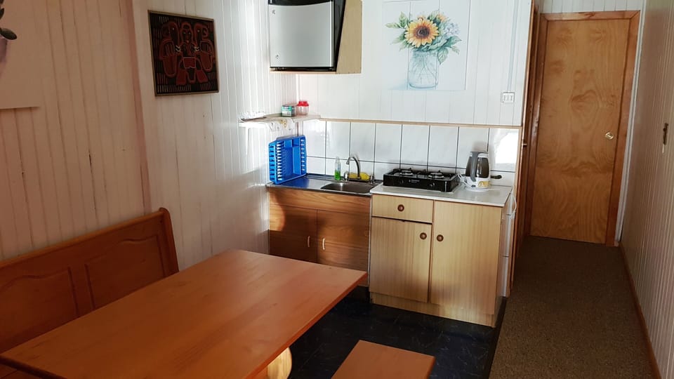 Departamento estándar, cuádruple | Private kitchen | Shared fridge, microwave