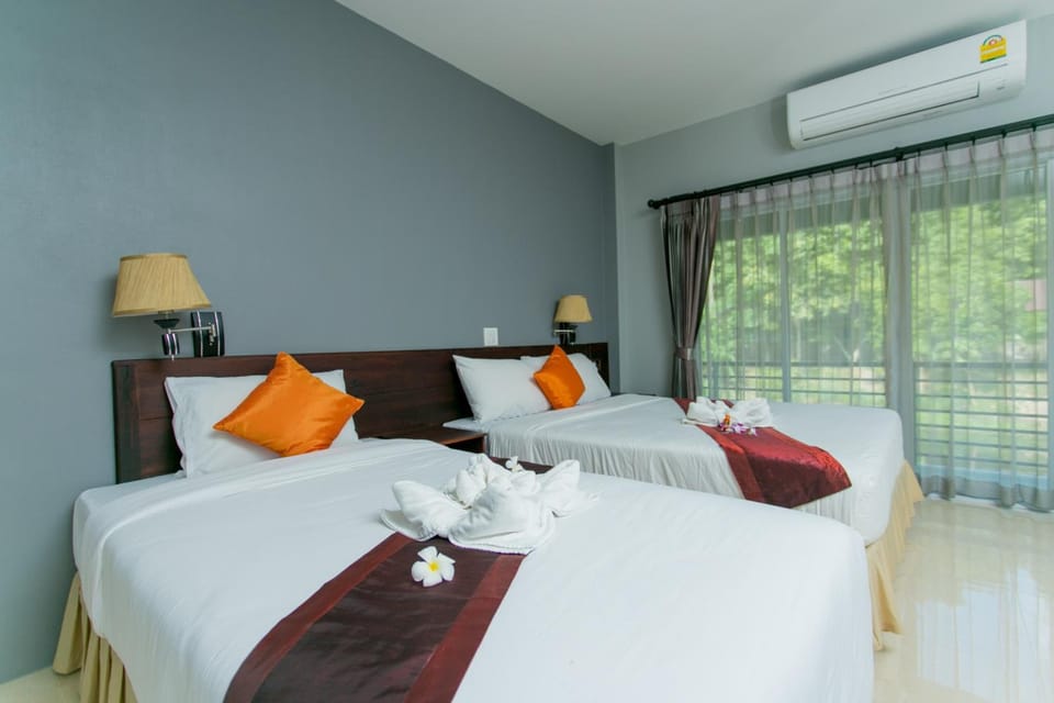 Blackout drapes, rollaway beds, free WiFi