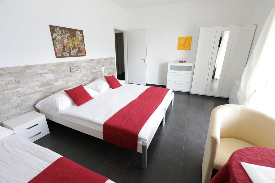 Triple Room, Lake View | In-room safe, free cribs/infant beds, rollaway beds, free WiFi