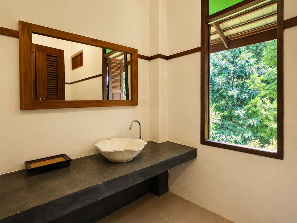 Deluxe Air Conditioned Villa | Bathroom | Shower, free toiletries, towels, soap