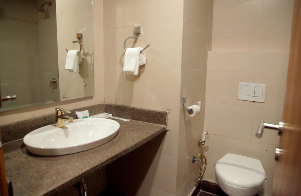 Shower, free toiletries, hair dryer, slippers