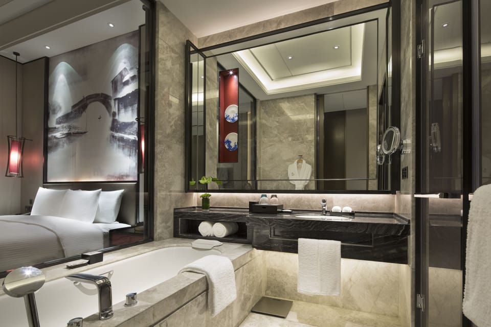 Separate tub and shower, jetted tub, free toiletries, hair dryer