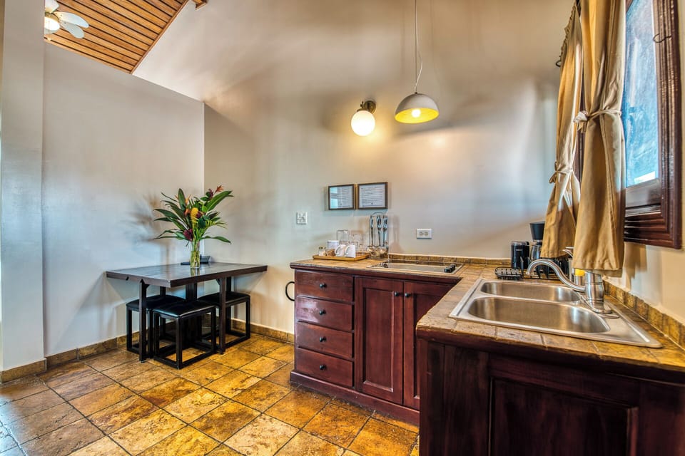 Luxury Suite, 1 King Bed, Sea View | Private kitchen | Coffee/tea maker, freezer