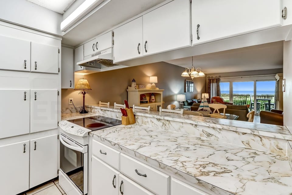 Condo, 2 Bedrooms | Private kitchen | Full-size fridge, microwave, oven, stovetop