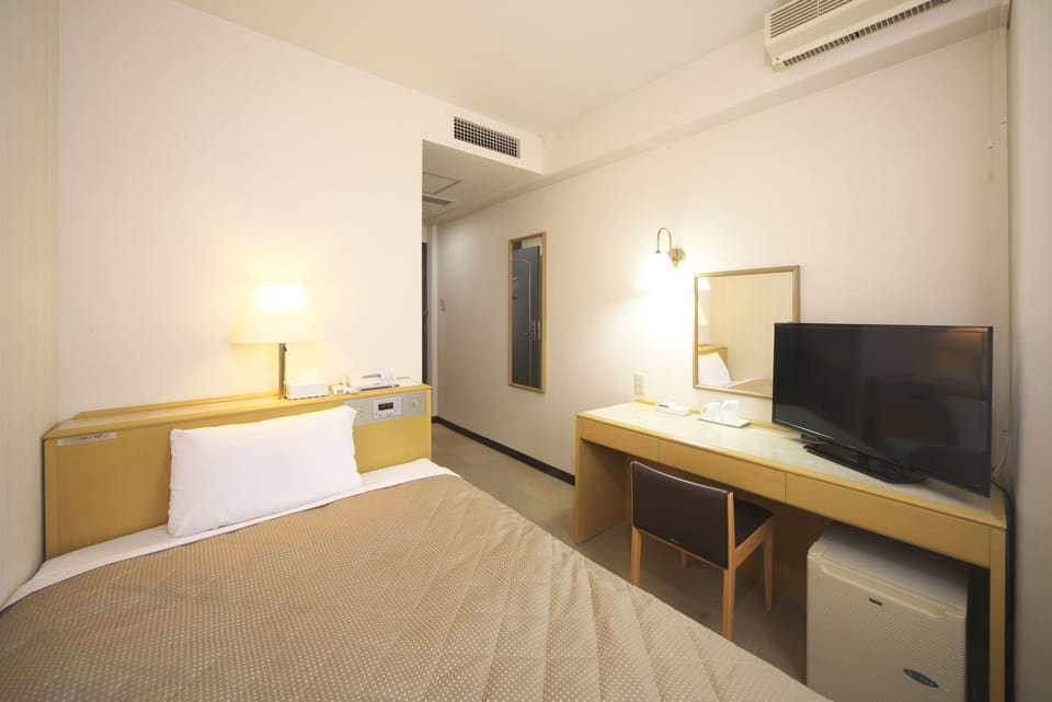 Desk, free WiFi, bed sheets