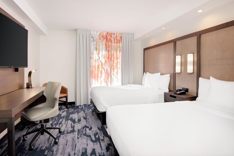 Premium bedding, down comforters, memory foam beds, desk