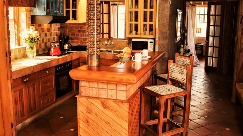 Family Apartment, 4 Bedrooms | Private kitchen | Microwave, electric kettle, toaster, eco-friendly cleaning products
