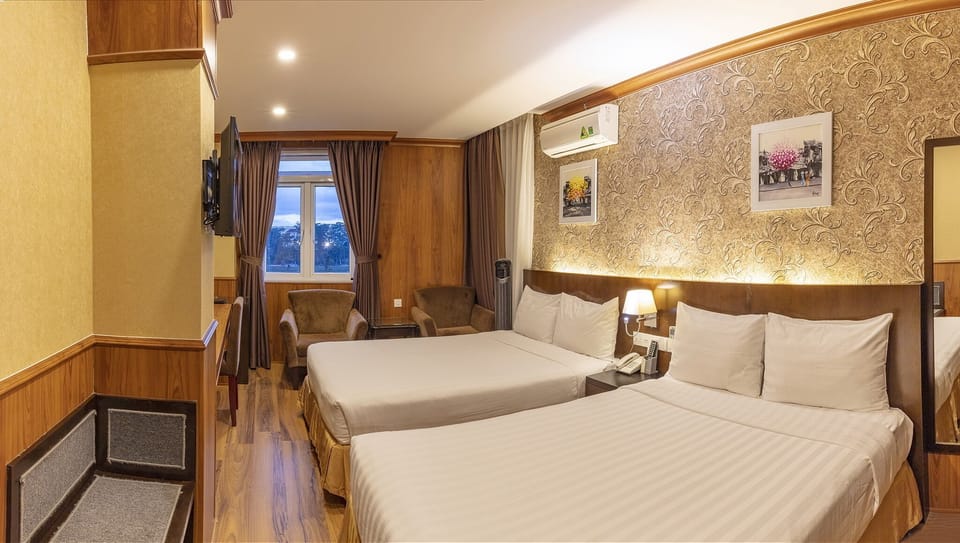 Deluxe Family Room, City View | Premium bedding, minibar, in-room safe, desk