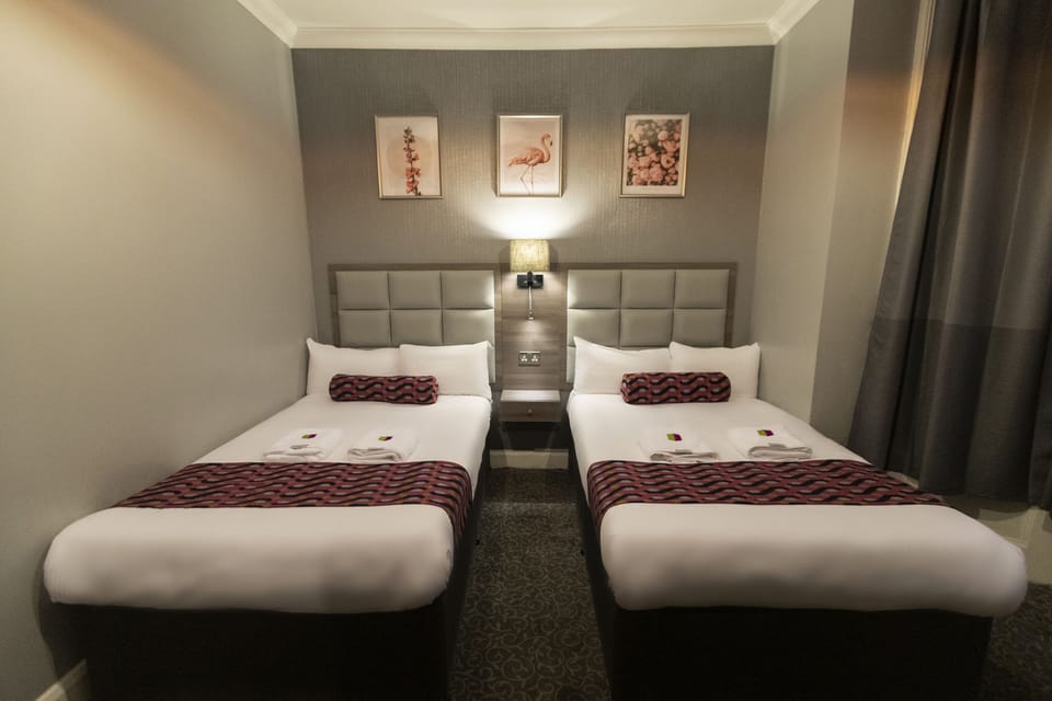 Quadruple Room | Desk, iron/ironing board, free WiFi
