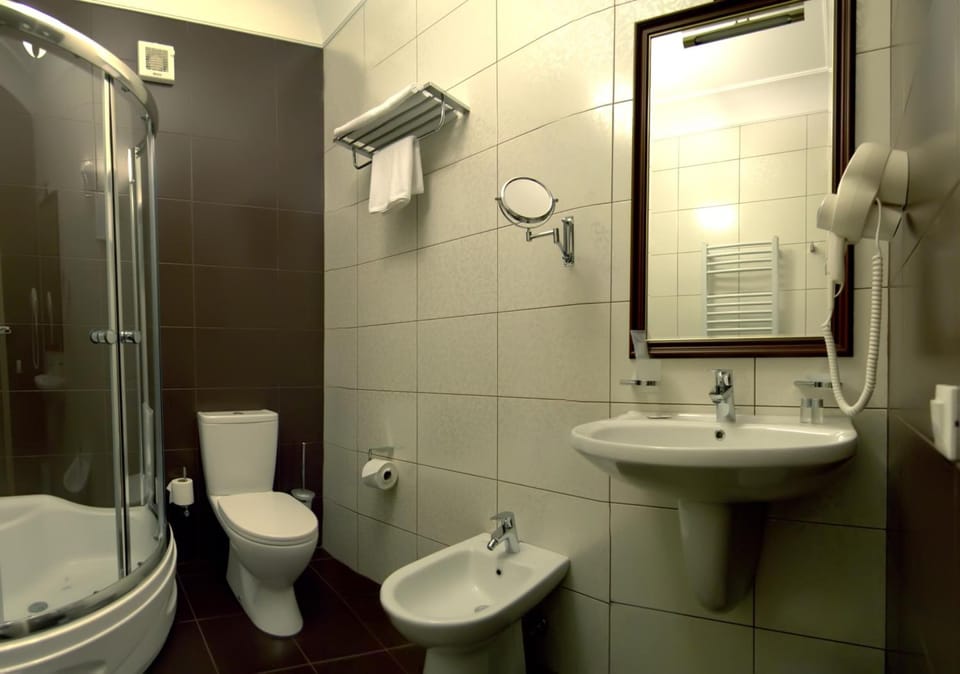 Shower, free toiletries, hair dryer, bathrobes