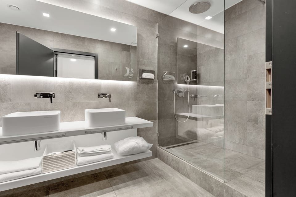 Designer toiletries, hair dryer, bathrobes, bidet