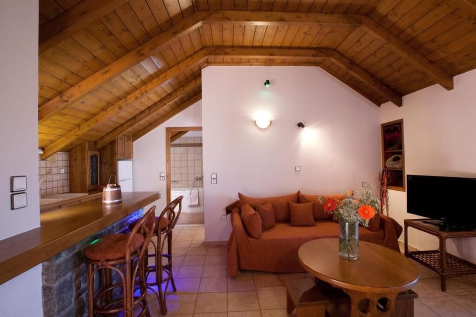 Family Suite | Living room | Flat-screen TV
