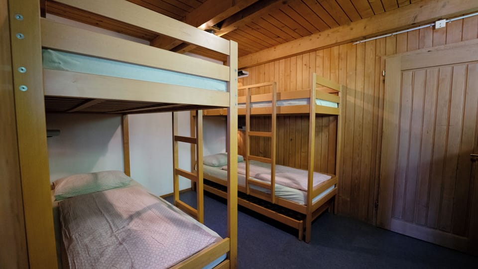 Quadruple Room, Shared Bathroom | Living area