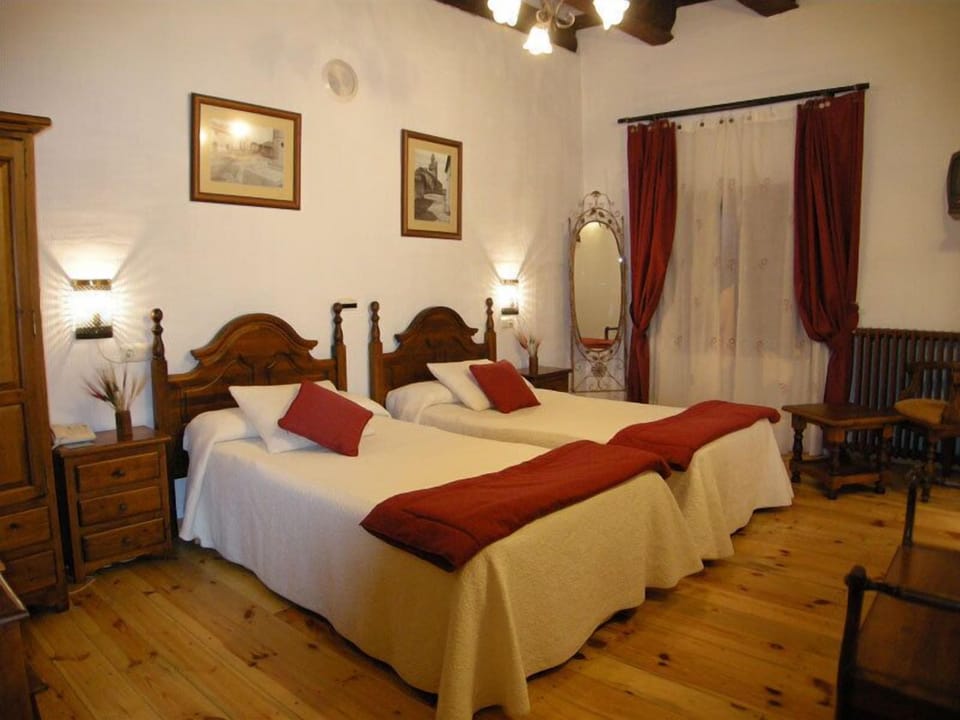 Double or Twin Room | Desk, blackout drapes, iron/ironing board, free cribs/infant beds