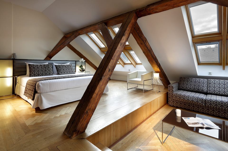 Deluxe Double Room | Minibar, in-room safe, individually decorated, individually furnished
