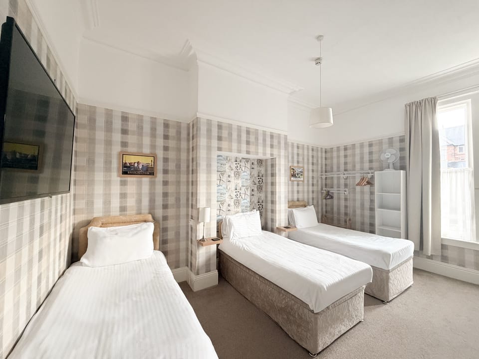 Family Room (Sleep 5) | Individually decorated, individually furnished, bed sheets