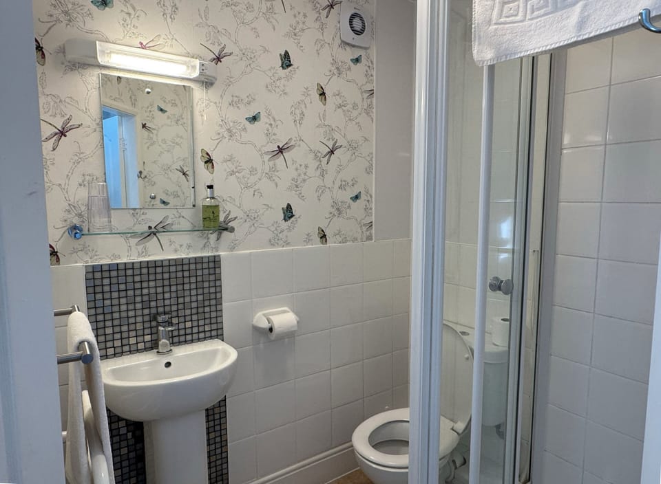 Family Room (Sleep 5) | Bathroom | Shower, hair dryer, towels, soap