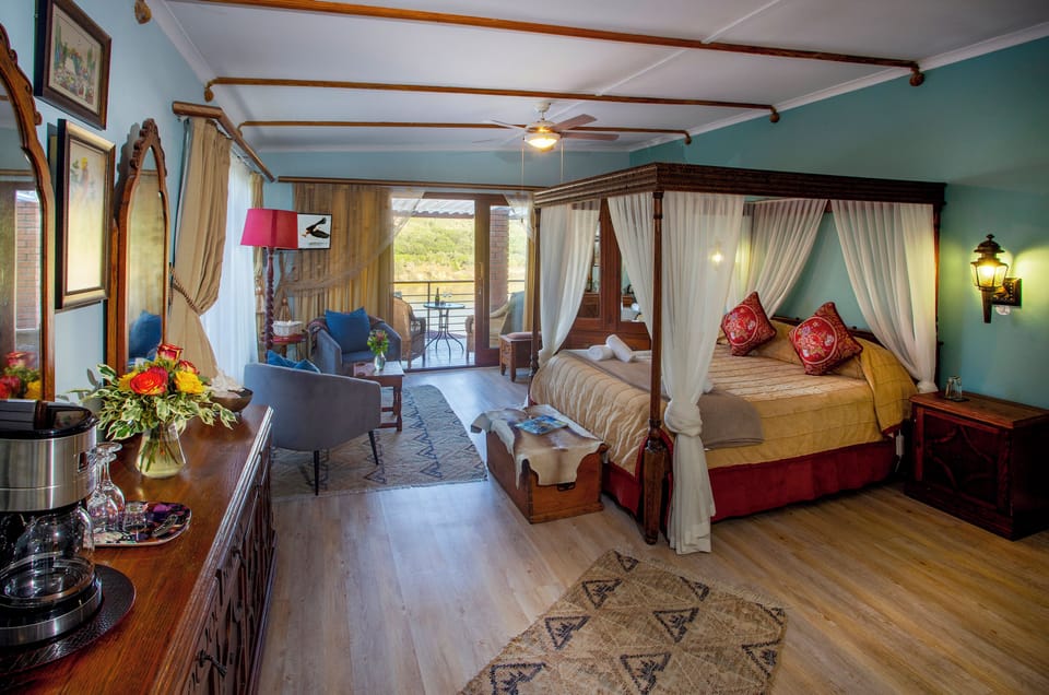 Superior Studio Suite, 1 Bedroom (Fish Eagle Suite ) | Minibar, in-room safe, individually decorated, individually furnished