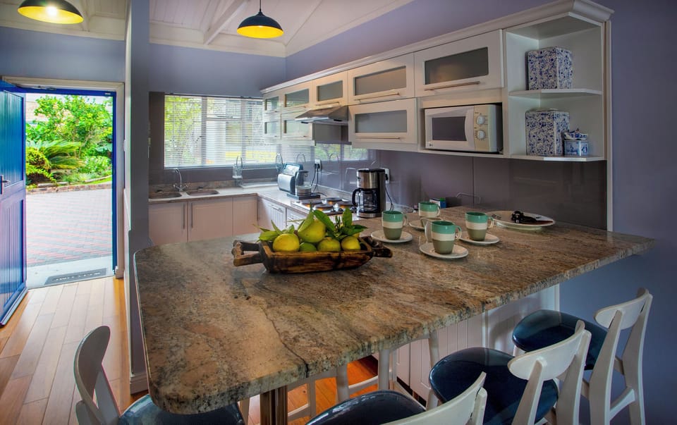 Deluxe Cottage (River Cottage ) | Private kitchen | Coffee/tea maker, electric kettle, reusable coffee/tea filters