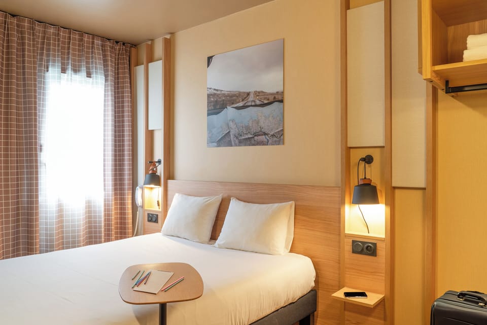 Premium bedding, laptop workspace, soundproofing