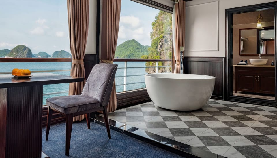 Honeymoon Suite, Sea View | Bathroom | Shower, hair dryer, slippers, towels