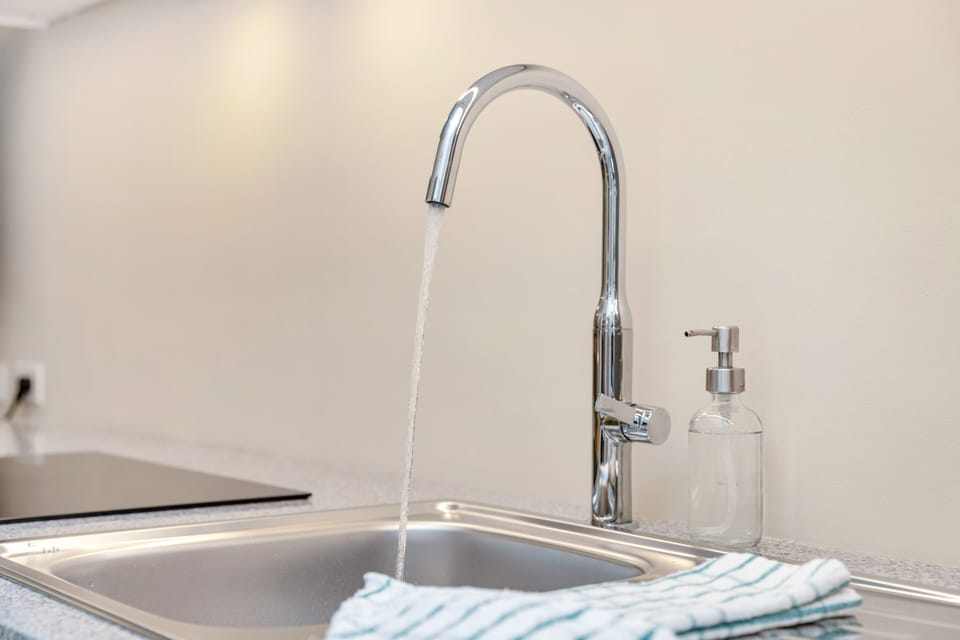 Deluxe Studio, Pool View, Poolside | Private kitchen | Full-size fridge, microwave, oven, stovetop