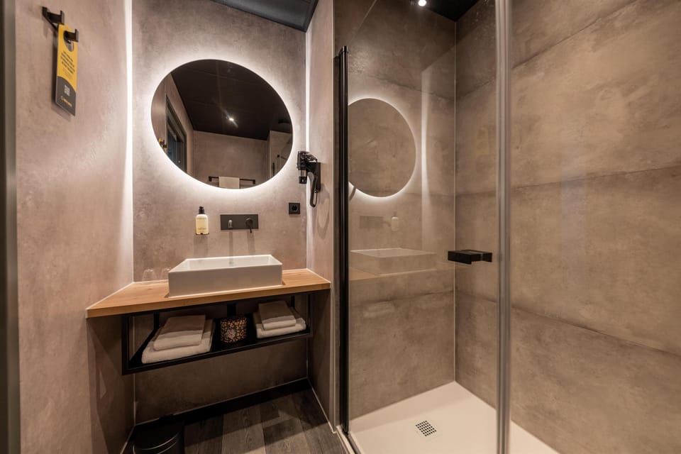 Eco-friendly toiletries, hair dryer, towels, soap