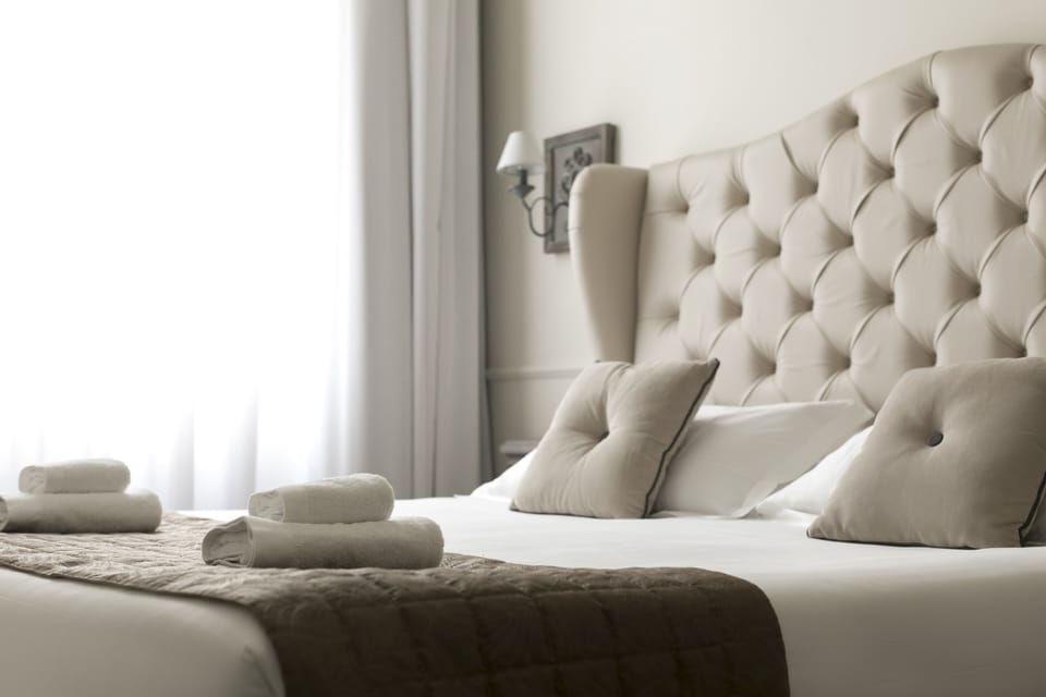 Frette Italian sheets, premium bedding, down comforters