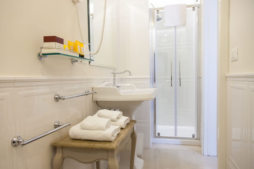 Superior Room, Non Smoking, Tower | Bathroom | Shower, free toiletries, hair dryer, slippers
